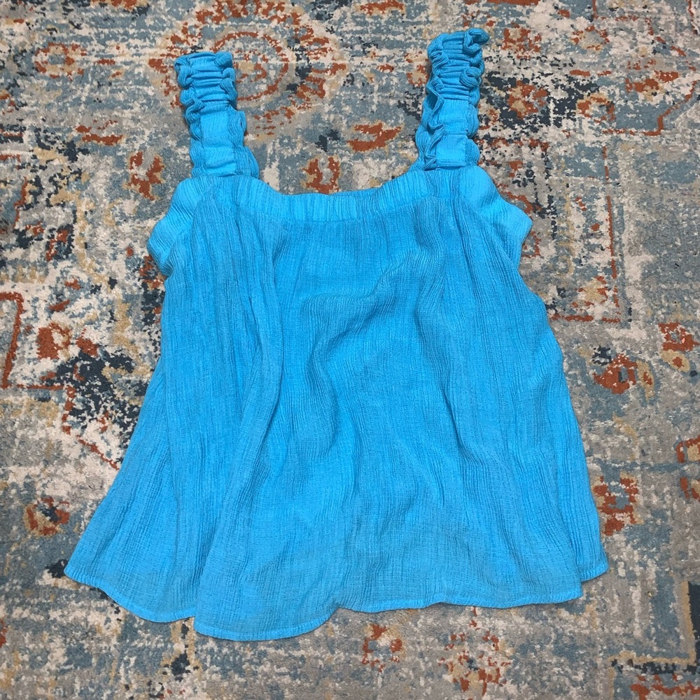 Dressy tank with thick shoulder straps.